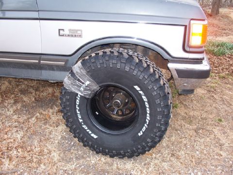 1990 Ford C-150 (Centurion Conversions) - Close-up of a BFGoodrich Mud-Terrain tire mounted on a 1990 Ford C-150 Classic.