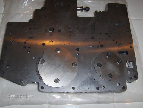 2004 Ford Crown Victoria - Close-up of a transmission valve body, likely for a Ford vehicle.
