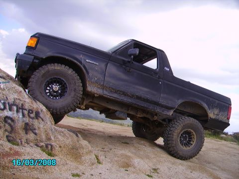 1990 Ford Bronco - This 1990 Ford Bronco is shown navigating a challenging rocky terrain.