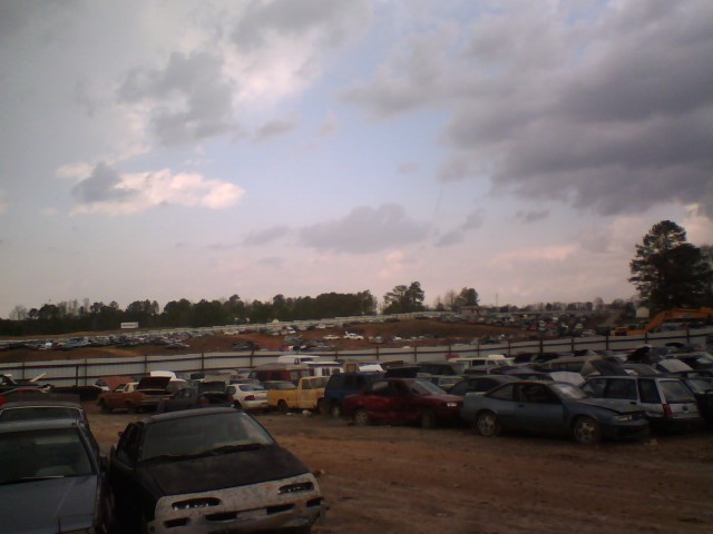 A lot of cars in the junkyard....