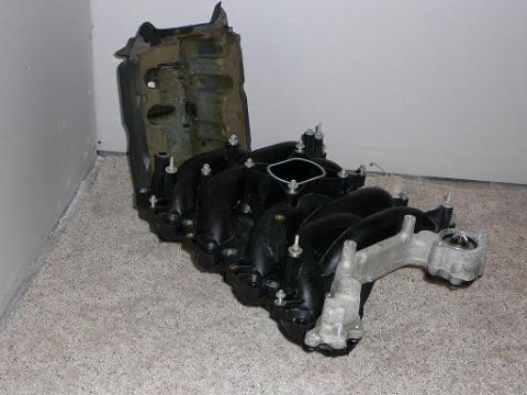1997 Mercury Grand Marquis - Includes Intake Manifold, Thermostat, Thermostat housing(not pictured) and heat shield. No bolts are included.