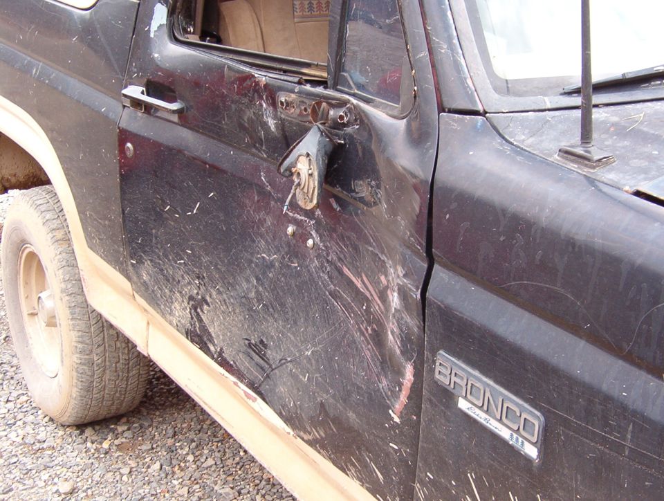 When we got onto the trails, my first task was to remove my passenger mirror on small tree.  Once that was out of the way, I got to the REAL task: caving in the door on a LARGER tree.

Good thing I sold those rare turn-signal mirrors instead of installing them.