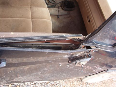 1983 Ford Bronco - I didn't do a very good job, though... No glass got broken, and after a couple of seconds bending the metal, I rolled the window back up. S…