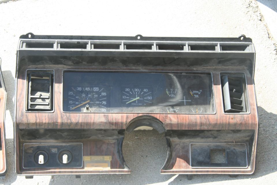 1989 Ford Bronco instrument cluster with woodgrain trim and gauges