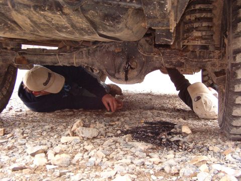 1983 Ford Bronco - After pulling the axleshafts, Greg drove ~100' down to the office to air up and discovered a fresh hole punched out of his rear diff (we di…