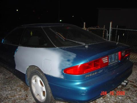 1993 Ford Probe - Rear view of a 1993 Ford Probe GT with bodywork in progress, showing primed panels.
