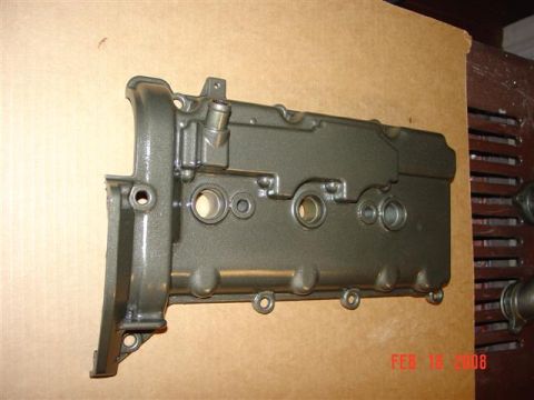 1993 Ford Probe - A gray engine valve cover is shown, likely after being cleaned or painted. The registry claims it is from a 1993 Ford Probe, but this is un…