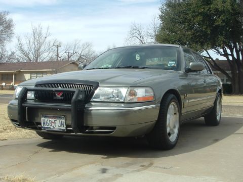 2003 Mercury Grand Marquis - This 2003 Mercury Grand Marquis has a push bar and a grille that resembles those found on police vehicles.