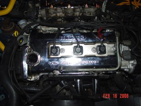 1993 Ford Probe - Close-up of a Mazda V6 DOHC 24-valve engine, likely from a car or SUV.
