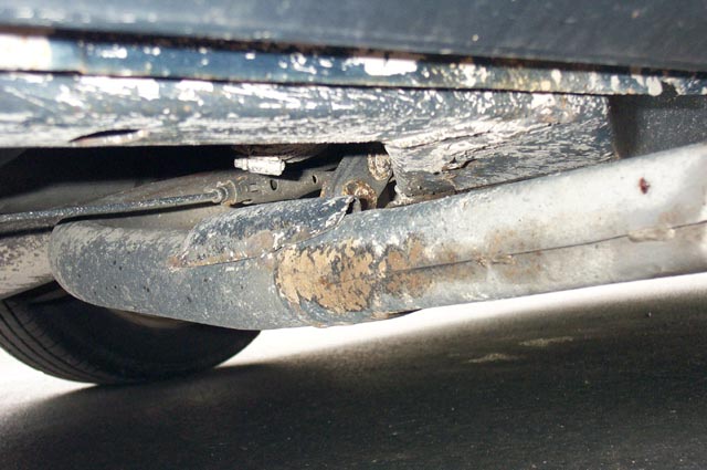 Close up of the heat shield...between the pipe and fuel filter mounted directly above.