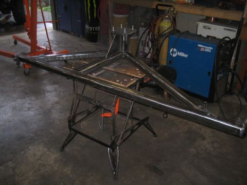 1989 Ford Bronco - Custom metal fabrication project in progress, with welding equipment visible.