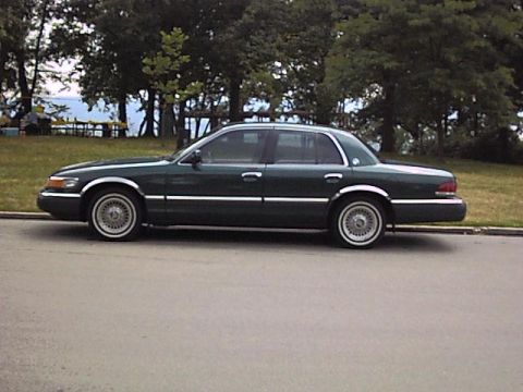 1993 Mercury Grand Marquis - My first body mod...stainless wheel arch mouldings.
