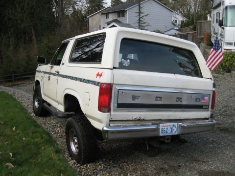 1980 Ford Bronco - This 1980 Ford Bronco is seen from the rear, a 4x4 decal and a Washington state license plate.