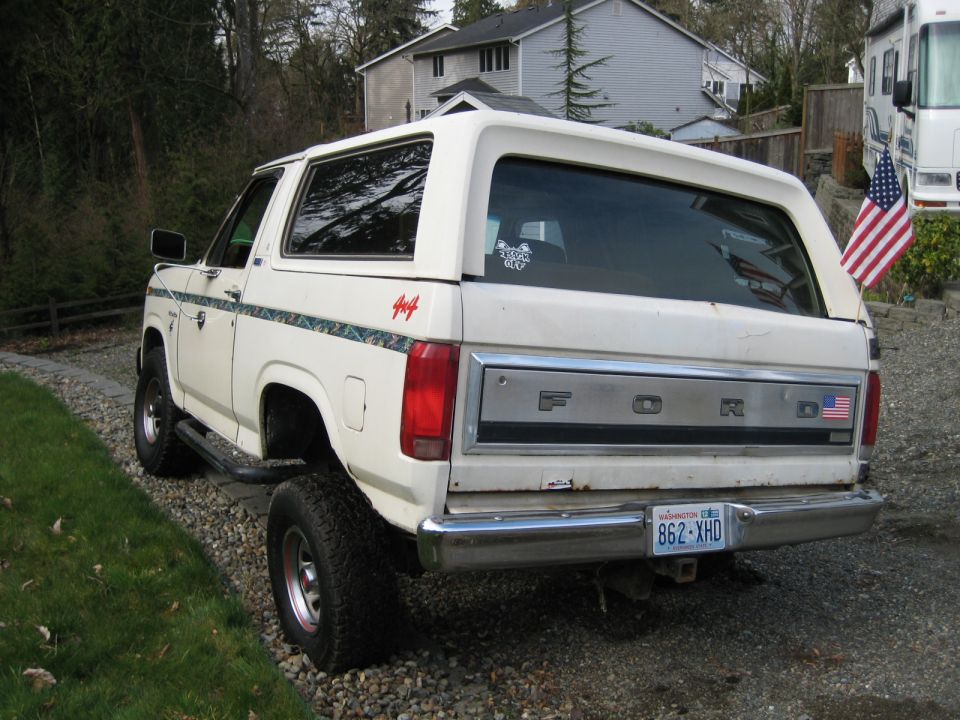 White 1980 Ford Bronco rear view with 4x4 decal and Washington license plate