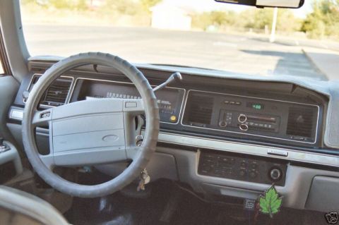 1991 Ford Crown Victoria - Interior view of a 1991 Ford Crown Victoria, highlighting the dashboard layout and instrumentation.