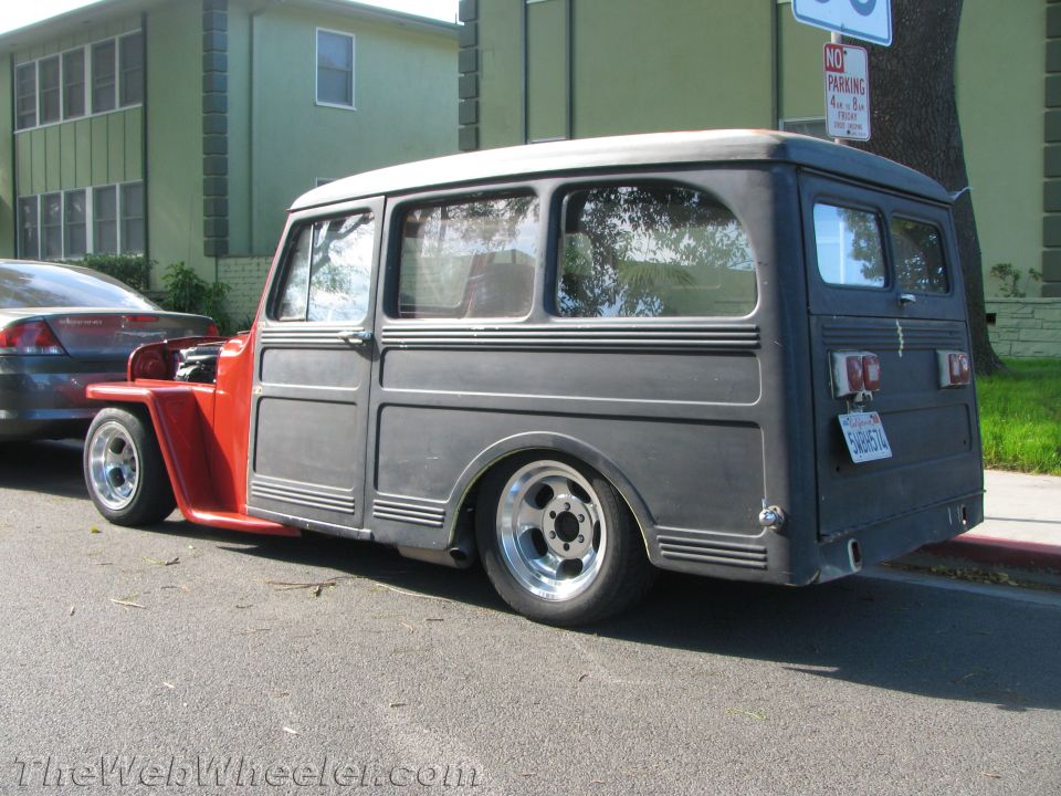 Gray Willys Station Wagon, rear 3/4 view, lowered with custom wheels