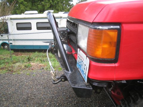 1989 Ford Bronco - This 1989 Ford Bronco features a heavy-duty front bumper with an integrated winch and a custom license plate.