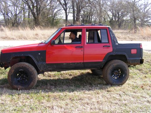 1981 Jeep CJ7 - This modified Jeep Cherokee pickup truck appears to be from the mid-1980s, not 1981.