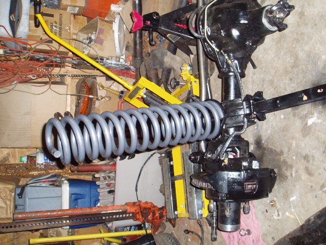 The coils are leaning when in the proper place, may have to make wedges for the lower retainer to keep the coils from bowing once they are installed.