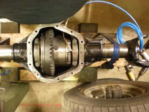 1993 Ford Bronco - Close-up of an open differential housing, showing the internal gears and axle components.