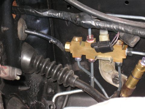 1968 Shelby GT500 - This brass proportioning valve is part of the vehicle's brake system.
