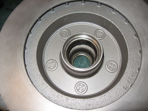1968 Shelby GT500 - Brake rotor and hub assembly shown from the front. The part has five lug bolt holes and a central bearing race.
