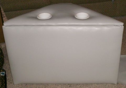 1983 Ford Bronco - Upholstered storage box with two circular openings on top.