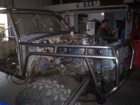 1982 Toyota 4Runner - This Toyota 4Runner, likely from the mid-1980s, is undergoing modifications with a prominent roll cage.