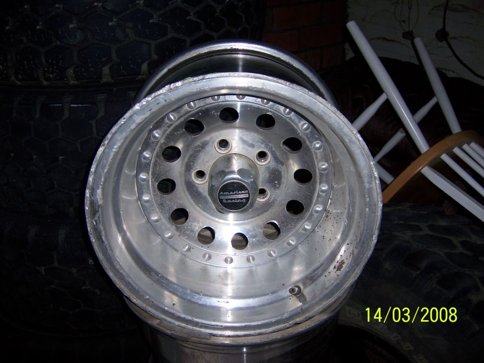 Close-up of an American Racing wheel with a date stamp of 14/03/2008