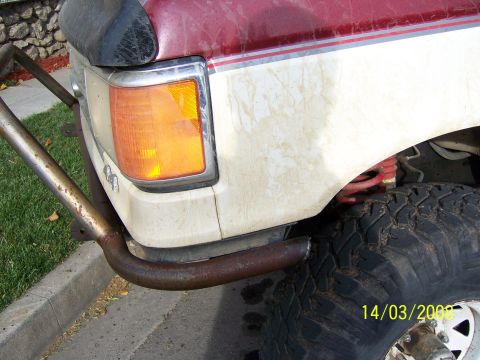 1991 Ford Bronco - Custom front bumper fabricated for a truck, with a date stamp of 14/03/2009 visible on the tire.