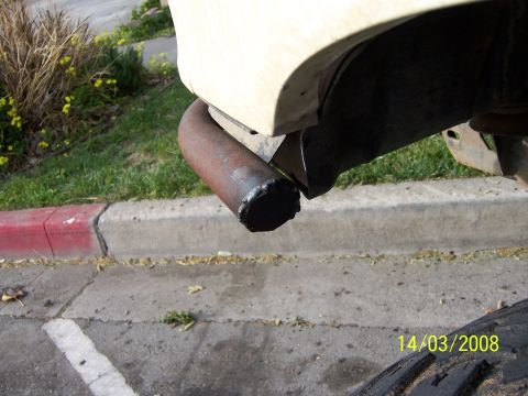 1991 Ford Bronco - Custom welded pipe attached to the rear frame of a vehicle.
