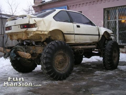 1980 Ford Bronco - This heavily modified Honda Civic features a custom chassis and enormous tires for off-road use.