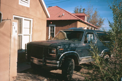 1980 Ford Bronco - This Ford Bronco is parked in front of a house with a red roof. The vehicle appears to be a second generation model.