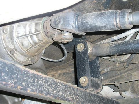 1979 Chevrolet C/K Pickup - Close-up of the drivetrain components, including the differential and driveshaft.