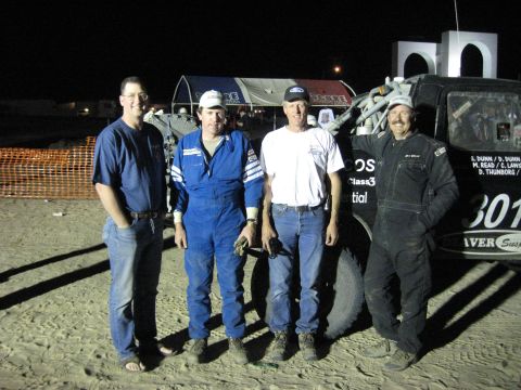 1994 Ford Bronco - Team poses with their 1994 Ford Bronco race truck before or after an event.