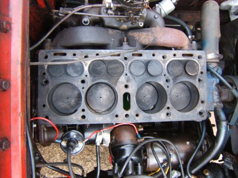 1946 Jeep CJ5 - Close-up view of an engine block, showing internal components and wiring, with some text at the bottom right.
