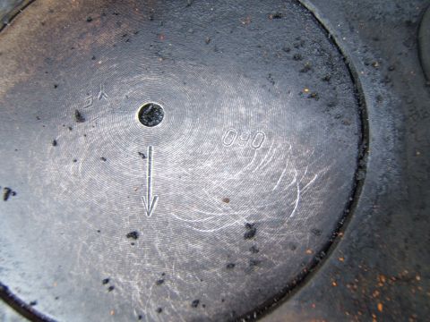 1946 Jeep CJ5 - Close-up view of an engine part showing the number '090' and directional arrow.