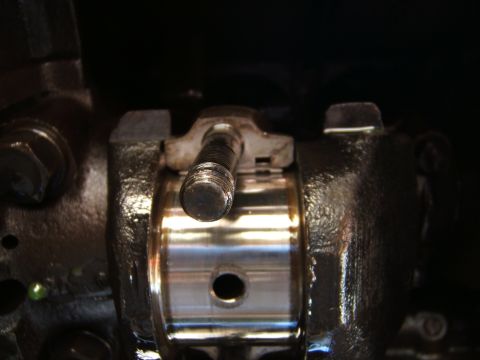 1946 Jeep CJ5 - A detailed view of an engine part, showing mechanical components.