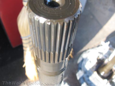 1987 Suzuki Samurai - A close-up view of a greasy splined shaft, possibly a drive shaft component.