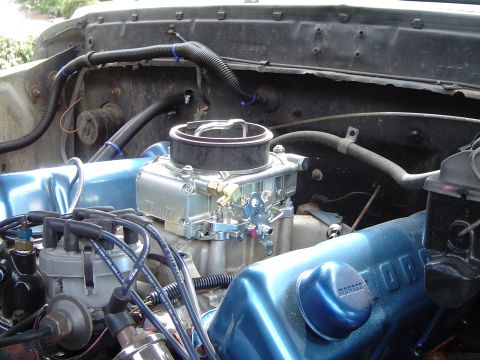 1978 Ford Bronco - Engine bay detail a new carburetor and blue painted valve covers.