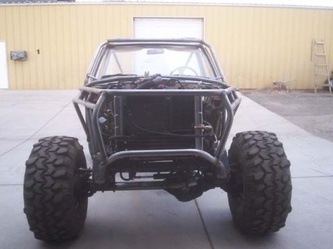 1982 Toyota 4Runner - This custom-built buggy features a prominent roll cage and aggressive off-road tires.