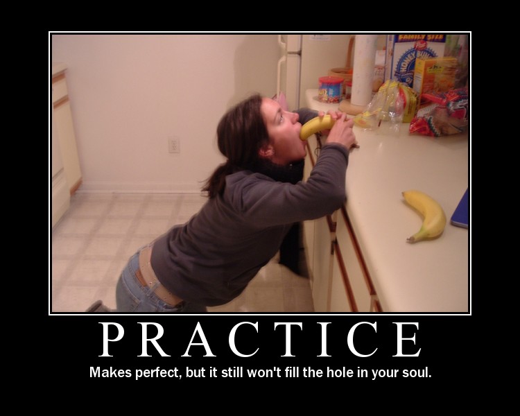 Woman on knees eating a banana, with another banana on a counter
