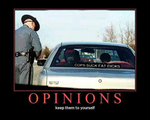 1996 Ford Bronco - A police officer approaches a vehicle with a controversial sticker on its rear window.
