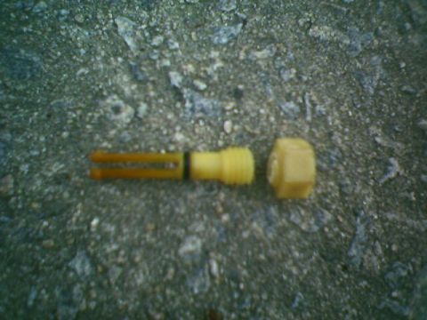 1997 Mercury Grand Marquis - Very Fuzzy picture of broken radiator drain plug