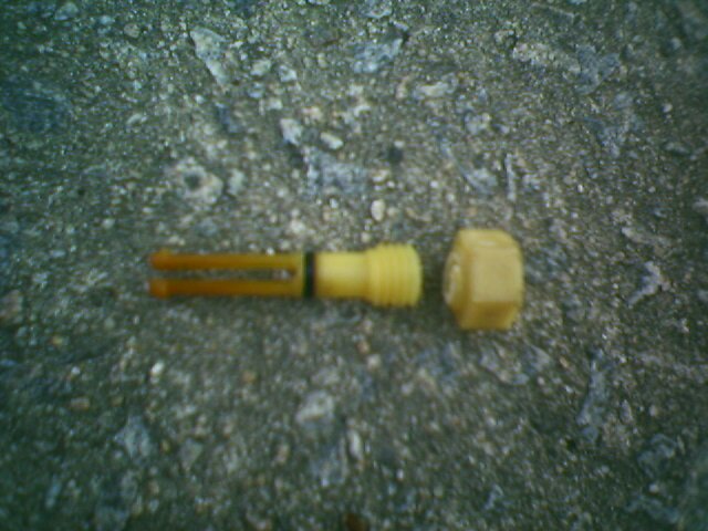 Very Fuzzy picture of broken radiator drain plug