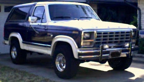 1981 Ford Bronco - This two-tone Ford Bronco features a prominent chrome grille and bumper.