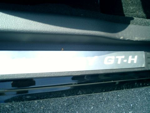 2007 Ford Mustang - Close-up of the GT-H door sill plate inside a 2007 Ford Mustang.