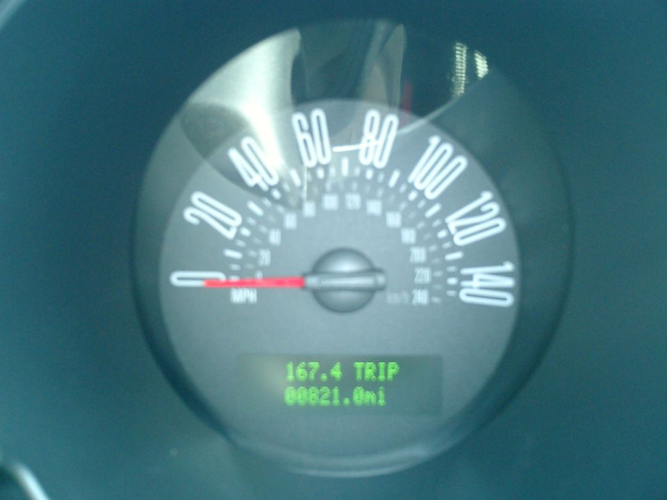 Speedometer of a 2007 Ford Mustang showing 0 mph and 8821.0 miles