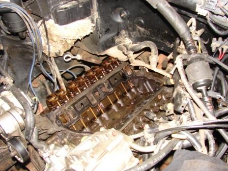 1989 Ford Bronco - Close-up view of an engine bay, showing internal components and wiring.