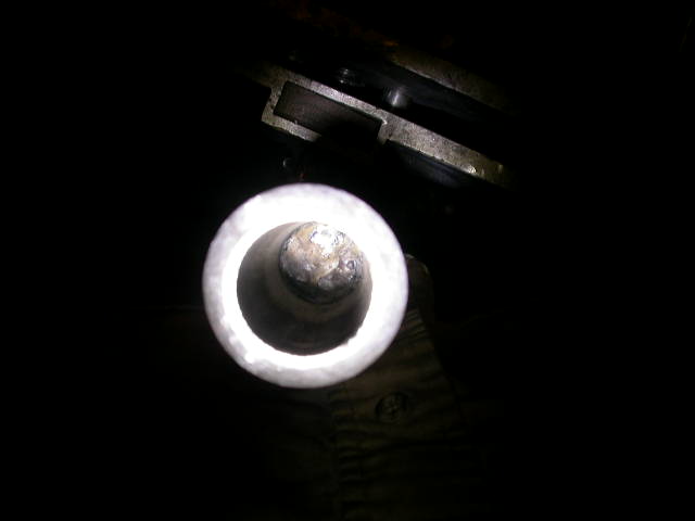 Can't have it sliding around in there, so I welded it in place on both ends.  It's about six inches deep in there, so I had to borrow a stick welder to reach all the way down in there.